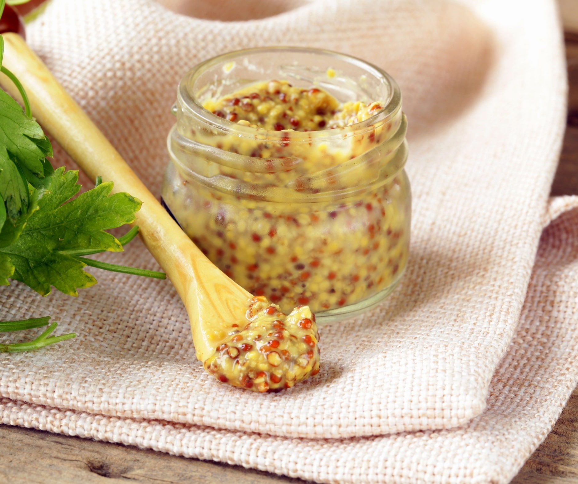 dijon mustard inside a glass jar