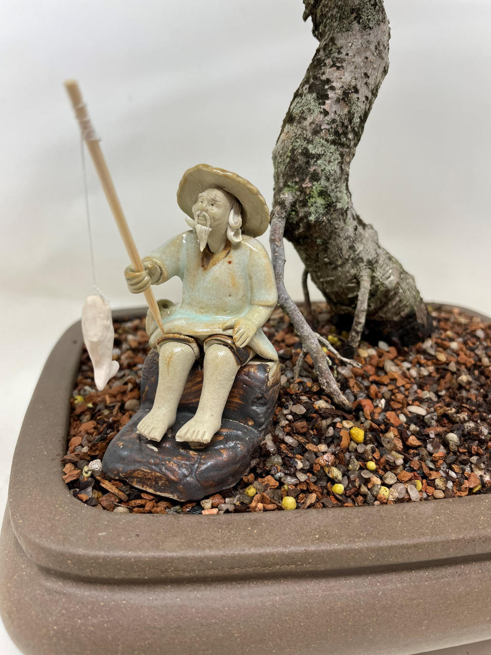 Chinese Figurine - Man Sitting on Rock Fishing (F-002)