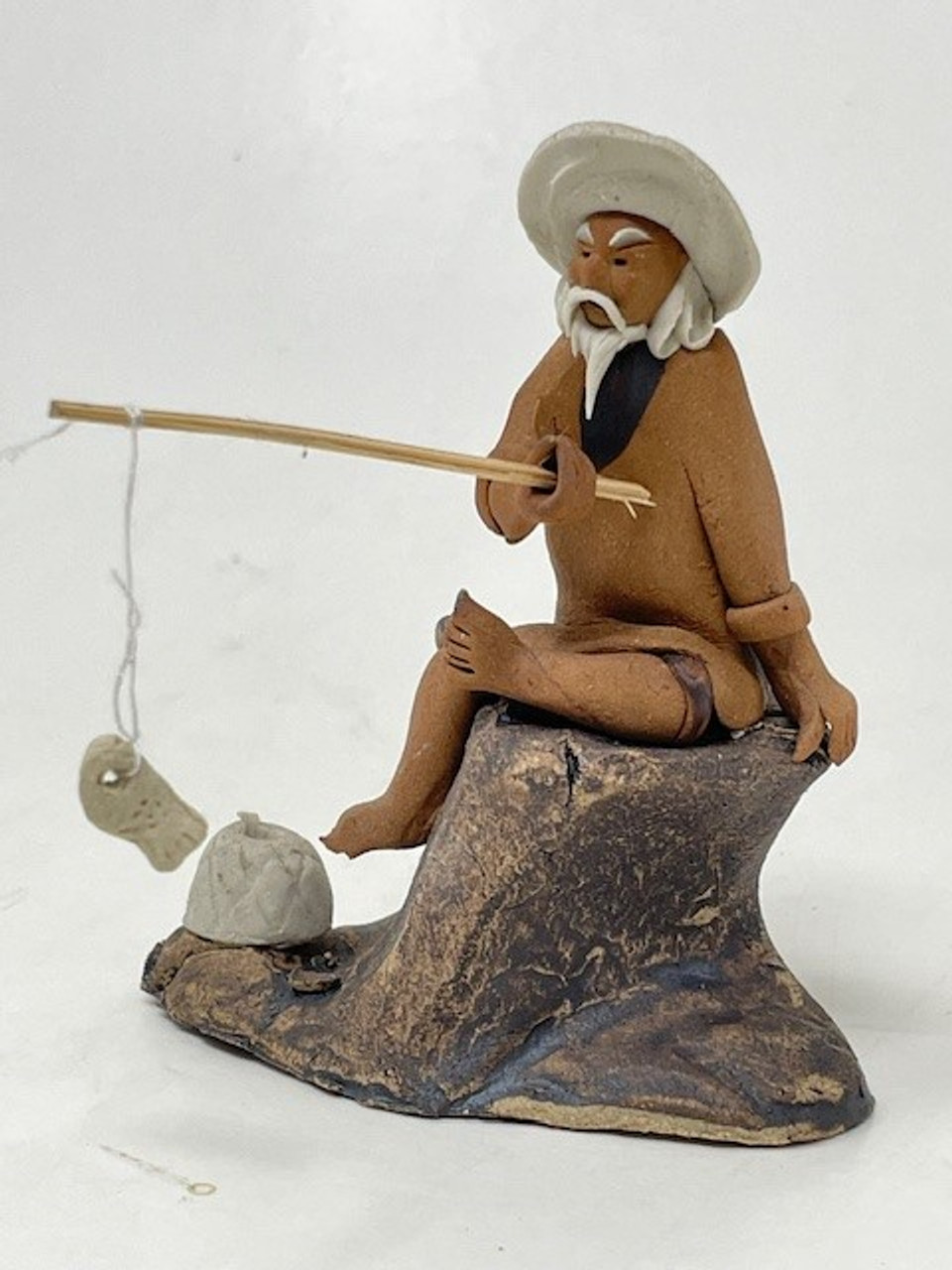 Chinese Figurine - Man Sitting Fishing off of a Rock (F-067)