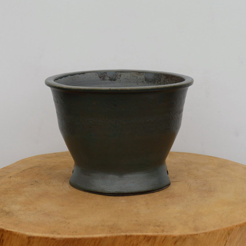 7 inch handmade deep bowl bonsai pot by Joshua Allen-Silvia on a wood slice, No. 21
