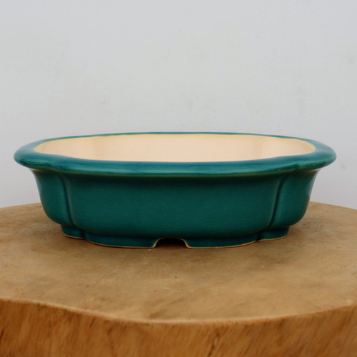 10 inch lobed oval Yixing bonsai pot in glossy teal green with a cream interior