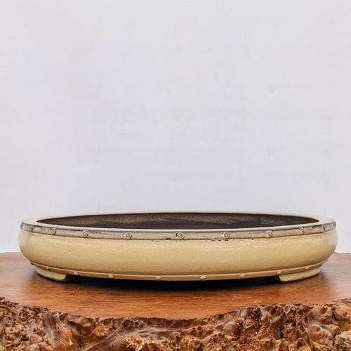 17 inch round drum-style Yixing bonsai pot in a creamy beige glaze