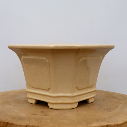 8 inch hexagonal cream glazed Yixing cascade pot with a flared rim