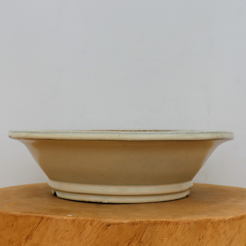 12 inch round Yixing bonsai pot in light cream with a tiered base