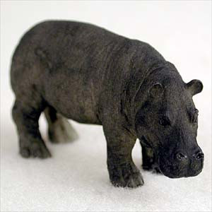 A detailed miniature hippopotamus figurine designed as a decorative accent for bonsai trees. The figurine is a dark, charcoal-grey to earthy brown color with a realistic, wrinkled skin texture that mimics the appearance of a real hippo. It is captured in a natural standing pose with its head slightly lowered and its stocky legs firmly planted. Shown against a plain, off-white background, this small animal sculpture is crafted to add a touch of nature and personality to a miniature garden or bonsai display.