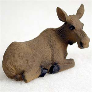 Miniature brown moose cow figurine resting with its legs tucked, a bonsai accessory