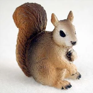 Miniature red squirrel figurine with textured fur, a decorative bonsai accessory
