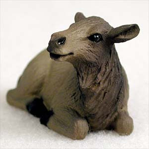 A detailed miniature figurine of a female cow elk in a restful, lying-down position with its legs tucked underneath and its head turned to the side. The figurine features a realistic fur-like texture in shades of brown and tan with darker accents on the nose and eyes. This elk cow figurine is designed as a decorative bonsai tree accessory to add a sense of scale and nature to a miniature landscape or Zen garden.