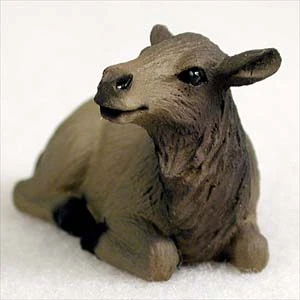 Miniature cow elk figurine lying down with its head turned, a bonsai accessory