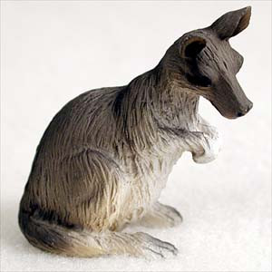 Miniature kangaroo figurine in a seated pose, a decorative bonsai accessory
