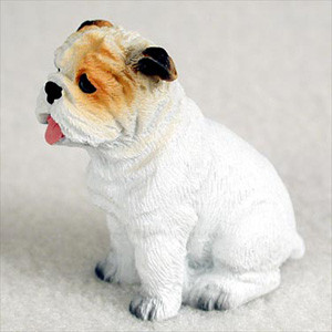 Miniature white bulldog figurine seated and facing left, a bonsai accessory