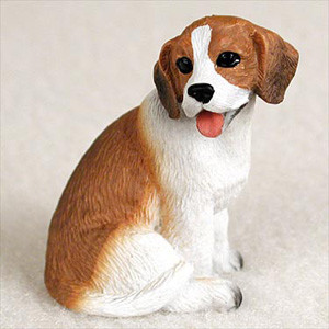 A detailed miniature figurine of a Beagle, designed as a decorative accessory for bonsai trees or fairy gardens. The small dog statue is depicted in a relaxed sitting position, looking slightly to the side with an adorable, happy expression and its pink tongue hanging out. 

The figurine captures the classic Beagle breed characteristics, including long, floppy brown ears, brown patches around its large dark eyes, a white muzzle ending in a black nose, and a coat of white and warm tan-brown. Fine, molded textures across the entire surface realistically mimic the appearance of short fur. The figurine is shown from a side-angled view against a plain, off-white background, emphasizing its lifelike details and small scale, perfect for nesting at the base of a bonsai tree.