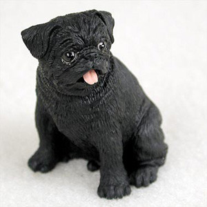 A detailed, miniature black pug figurine designed as a decorative accessory for a bonsai tree or terrarium. The small sculpture depicts a pug sitting upright on its haunches, looking alert and cheerful. Its deep black coat features a realistic textured finish mimicking short fur, especially around its wrinkled face and sturdy legs. The pug has classic breed characteristics, including a flat muzzle, small folded ears, and large, dark, shiny eyes that look slightly off-camera. Its mouth is partially open in a happy expression, revealing a small, soft pink tongue sticking out. The figurine is set against a simple, light-colored background, emphasizing its compact size and intricate craftsmanship for bonsai enthusiasts.