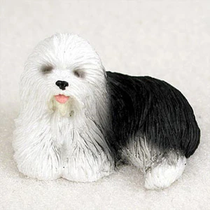 Miniature Old English Sheepdog figurine with a thick shaggy coat