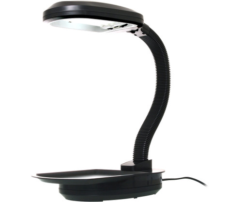 A sleek, matte black desktop LED grow light stands against a plain white background, designed specifically for indoor plant care. The lamp features a wide, oval-shaped base with a shallow tray indentation, perfectly sized to hold a small bonsai tree pot. A flexible, black ribbed gooseneck arm extends vertically from the rear of the base, curving forward to position the wide, rectangular lamp head directly over the tray area. The underside of the lamp head is illuminated, emitting a bright, full-spectrum white light downward to mimic natural sunlight. A thin black power cord extends from the back of the base, completing this functional and modern tool for nurturing bonsai trees in low-light environments.