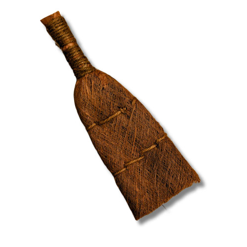 A detailed studio shot of a traditional hemp broom, an essential tool for bonsai tree maintenance and care. The broom is handcrafted from dark, chestnut-brown natural hemp fibers. Its handle is created by tightly wrapping the fibers with a matching dark cord, ensuring a sturdy and comfortable grip for delicate work. The broom's head is flat and fans out slightly towards a straight bottom edge, reinforced with two horizontal rows of decorative zigzag stitching that keep the fine bristles neatly aligned. Set against a clean white background with a soft shadow, the broom is positioned at a diagonal angle, showcasing its rustic texture and functional design intended for gently sweeping away loose soil, dust, or debris from bonsai pots and moss-covered surfaces.