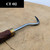 Close-up of the Tinyroots CT-02 bonsai carving tool on a light brown surface