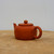 Small Yixing zisha clay teapot in unglazed reddish brown, model YTP-04