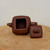 Full view of the dark brown Yixing teapot YTP-12 with its lid detached