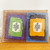 Two vibrant handmade rice paper greeting cards in a clear sleeve