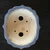 Top-down view of the 7 inch Yixing pot YX1030-1A on dark wood