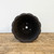 Top-down view of the dark brown cascade pot with a scalloped rim