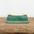Upside down view of the emerald green glazed bonsai pot
