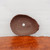 Overhead view of the unglazed Japanese pot in deep reddish brown