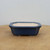 Shallow blue glazed pot with clipped corners in an octagonal profile