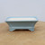 Side view of the matte sky blue glazed rectangular bonsai pot