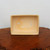 Top-down interior view of the rectangular cream glazed pot