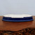 Shallow oval pot with a high gloss deep blue glaze