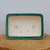 Overhead view of the rectangular green glazed bonsai pot