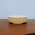 5 inch round Yixing bonsai pot in speckled cream with a hobnail design