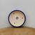 Top-down view into the round cobalt blue glazed bonsai pot