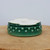 Underside of the round pot in emerald green crackle glaze