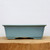 Side profile of the light blue glazed rectangular bonsai pot