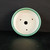 Top-down view of the round pot with a wide emerald green rim