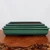 Three rectangular seafoam green pots stacked by size