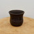 Small unglazed dark brown pot with a round bell-like shape