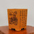 Square unglazed pot in vibrant orange-brown terracotta