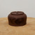 Underside of the reddish brown unglazed etched planter