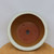 Top-down view of the round Yixing glazed pot's interior