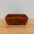 Front view of the rectangular unglazed reddish brown Yixing pot