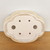 Underside of the 10 inch cream glazed Yixing ceramic pot