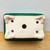 Underside of the small rectangular Yixing ceramic bonsai pot