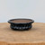 4 inch handmade bonsai pot by Brandon Besserer with a glossy black glaze and a rounded rim
