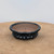 Brandon Besserer handmade bonsai pot No. 5 on a light wooden surface