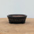 4 inch Brandon Besserer oval bonsai pot with a dark metallic glaze, No. 11