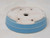 Underside of the light blue pot with four feet and five holes